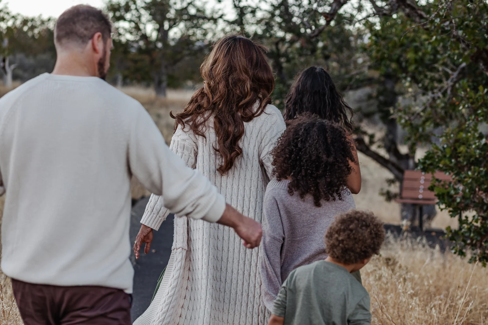 The Hanson family walking together in the Rogue Valley